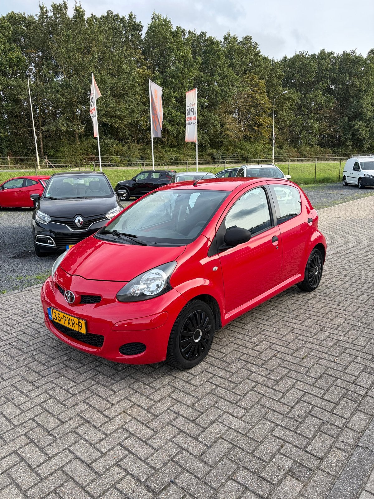 Toyota Aygo 1.0 12V Vvt-i 5DRS 2011 Rood, Auto's, Voorwielaandrijving, 4 stoelen, 68 pk, Origineel Nederlands