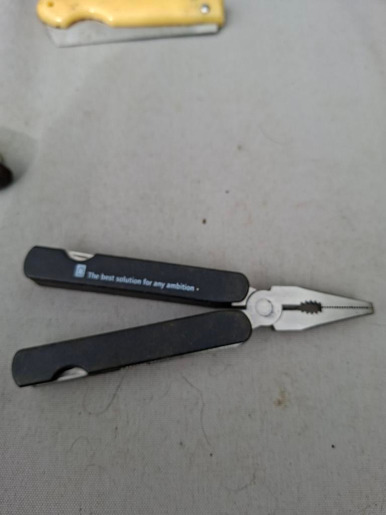 Multitool met tang en diverse functies, Doe-het-zelf en Verbouw, Gereedschap | Handgereedschap, Ophalen of Verzenden, Gebruikt
