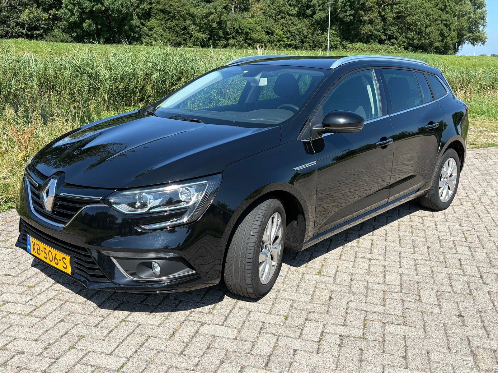 Renault Mégane 1.5 DCI 81KW Estate 12-2018 Limited Zwart, Auto's, Renault, Voorwielaandrijving, Leder en Stof, Zwart, Origineel Nederlands