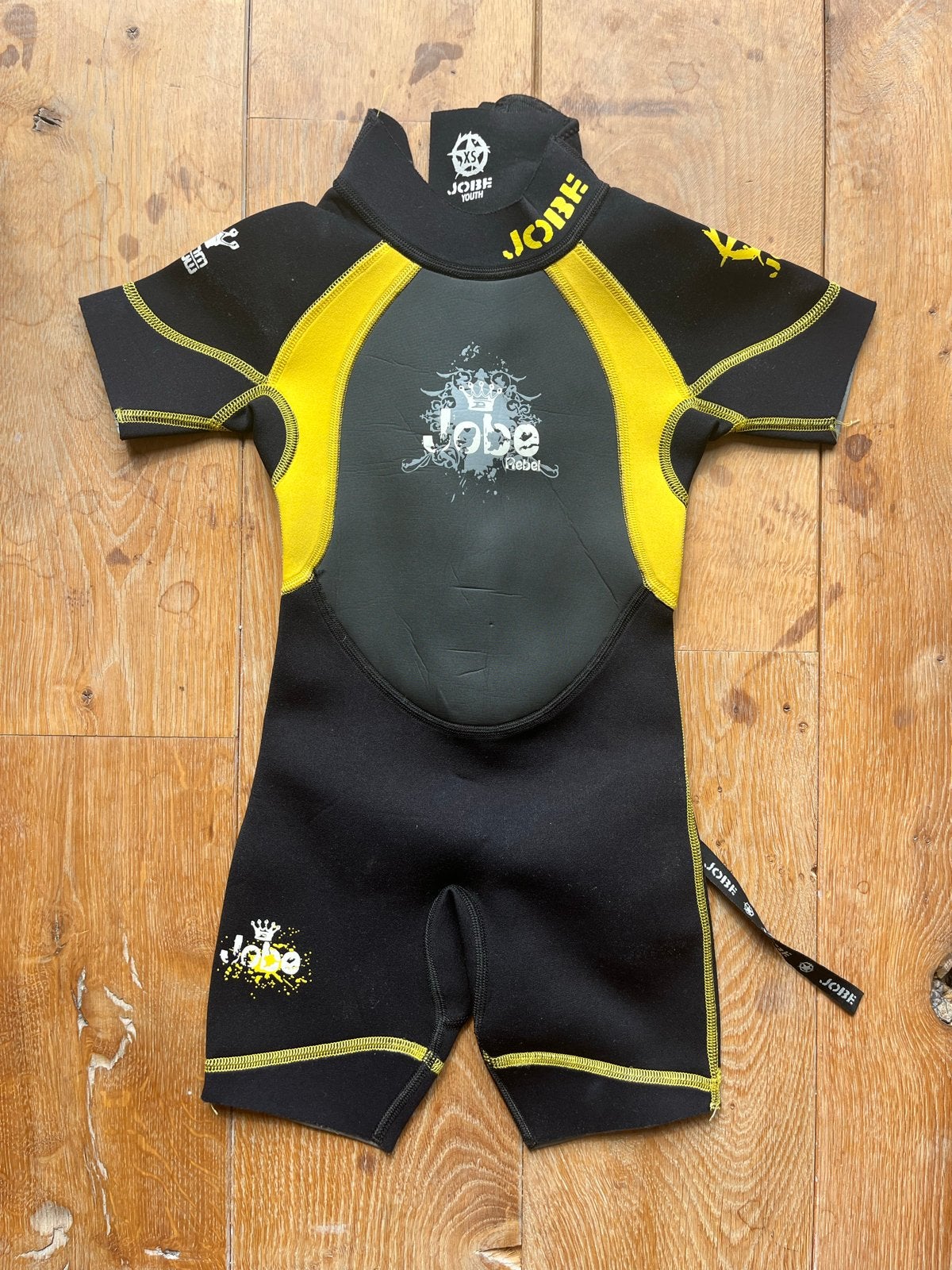 Jobe Rebel Wetsuit XS - Zwart/Geel, Watersport en Boten, Ophalen of Verzenden, Gebruikt, Kind, Wetsuit