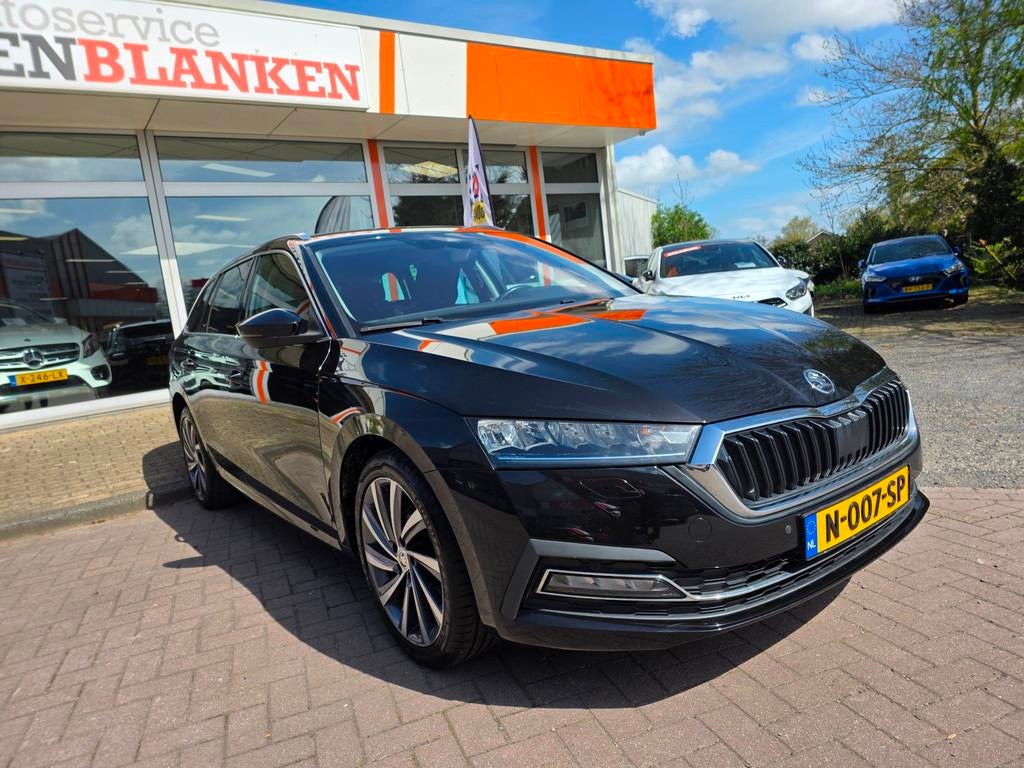 Skoda Octavia Combi 1.0 e-TSI Business Edition Plus Automaat, Auto's, Stof, Gebruikt, Origineel Nederlands, 690 kg