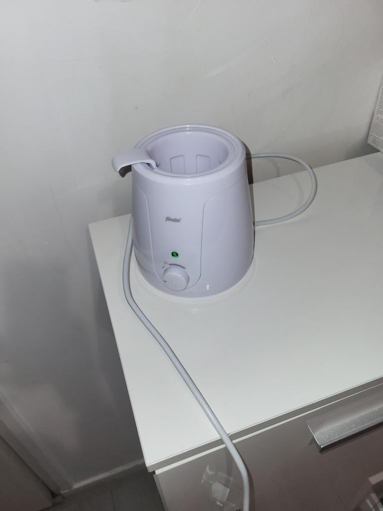 Handige flessenwarmer voor babyvoeding, Ophalen of Verzenden, Gebruikt, Flessen- of potjesverwarmer