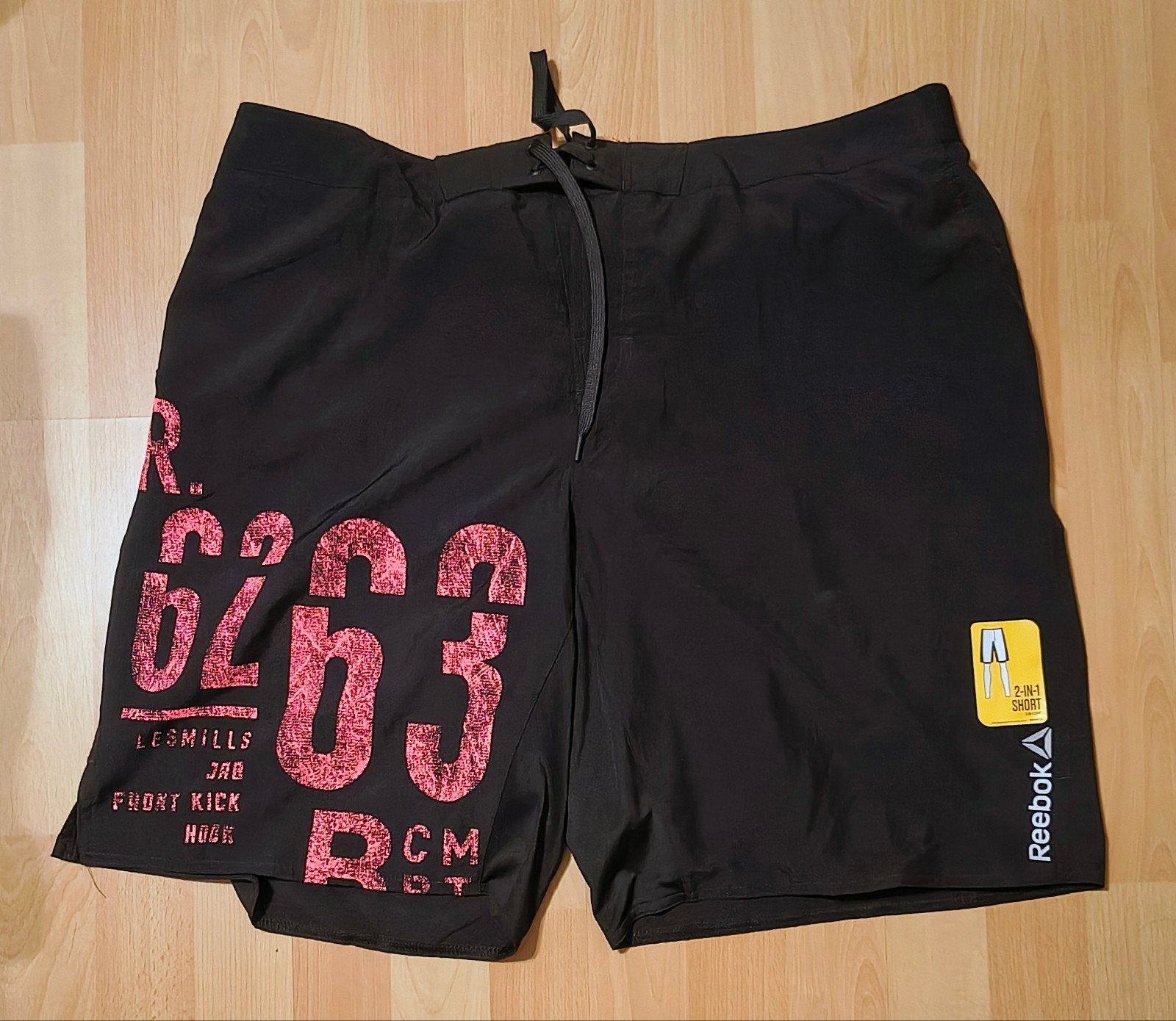 NIEUW! Reebok Les Mills 2-in-1 sportshort - Zwart - Maat XL, Fitness, Zwart, Ophalen of Verzenden, Reebok