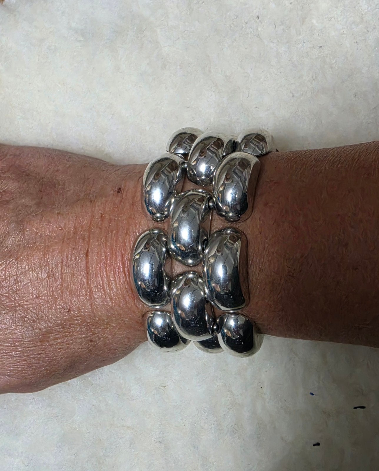 Brede zilverkleurige armband., Ophalen of Verzenden, Gebruikt, Zilver, Zilver