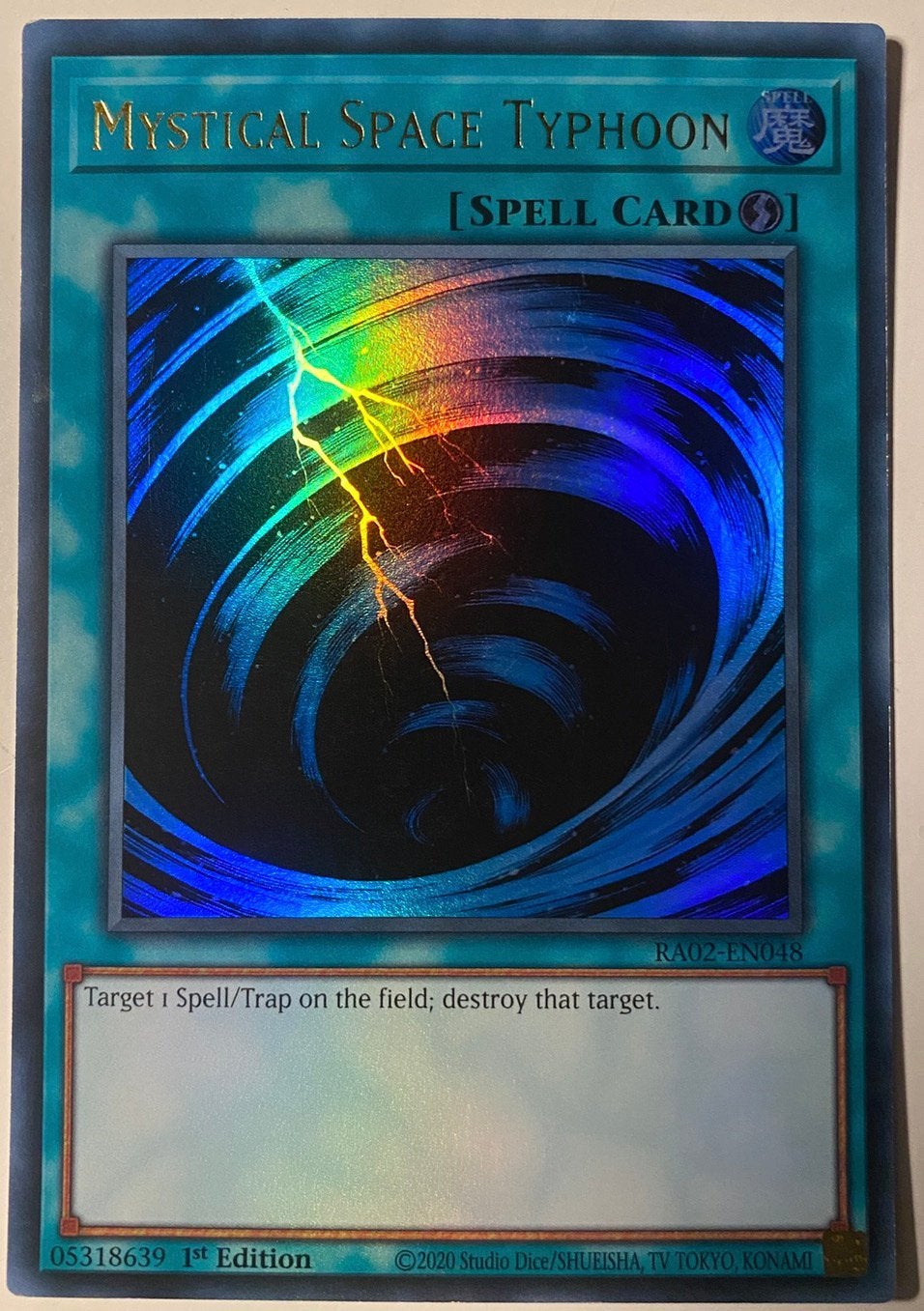 Yu-Gi-Oh! Mystical Space Typhoon RA02 1st Edition !, Ophalen of Verzenden, Zo goed als nieuw, Losse kaart, Foil