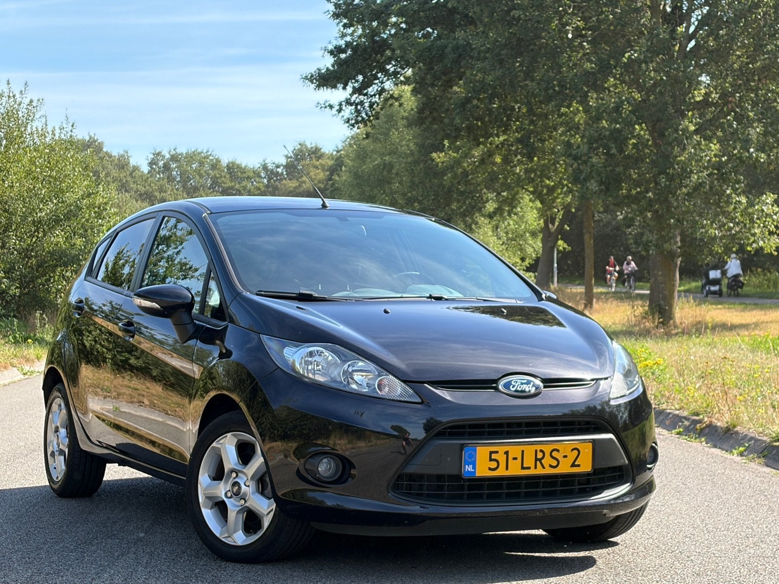 Ford Fiësta 1.25 Titanium 5DRS 2010 Zwart Nwe Apk Airco NAP, Voorwielaandrijving, Euro 5, Stof, Zwart