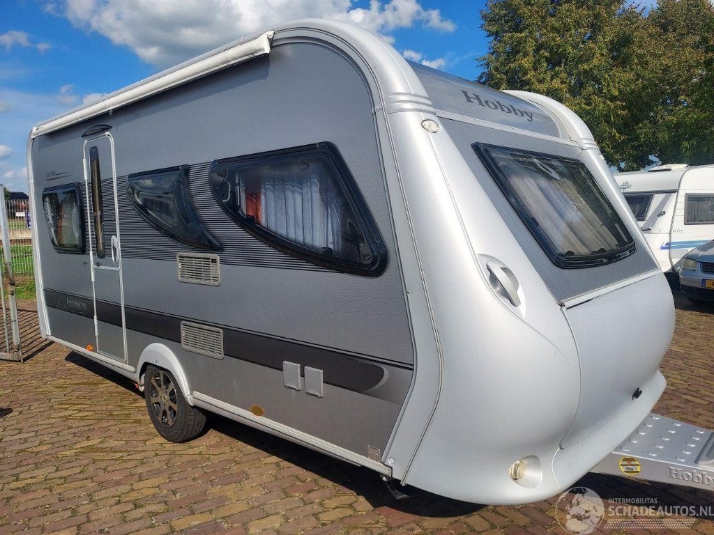 Hobby La vita 455 Bj 2011 Mover en luifel 9850 euro, Vast bed, Hobby, Bedrijf, Treinzit
