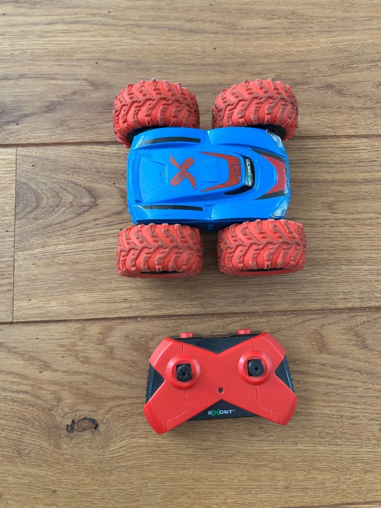 Exost cross bestuurbare stuntauto, Ophalen of Verzenden, Gebruikt