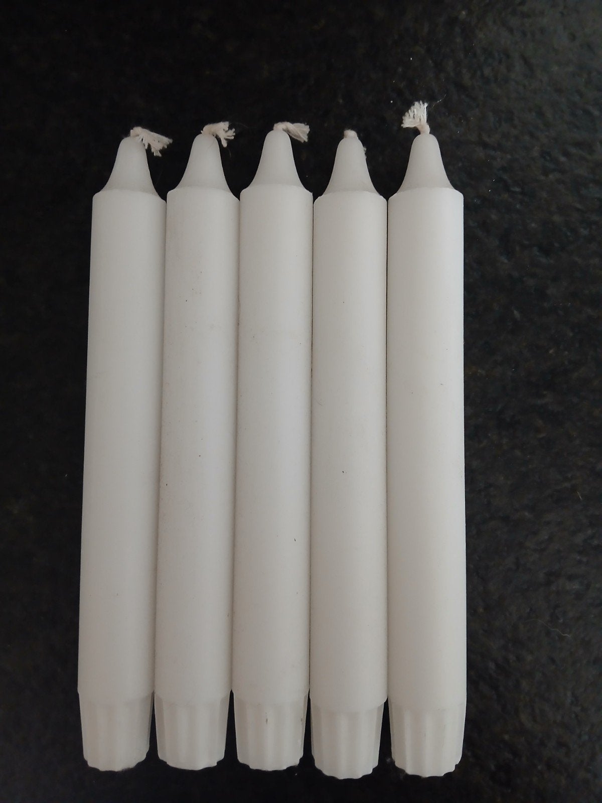Witte kaarsen, Ophalen