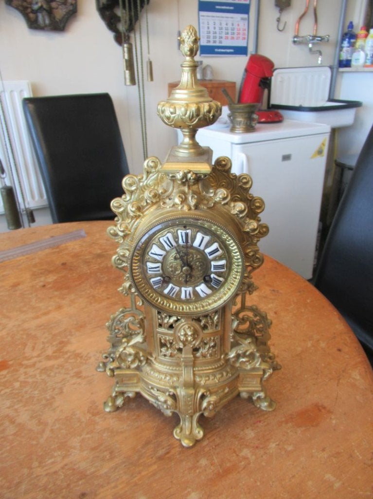 Oer 11673 kleine bronzen pendule, Ophalen