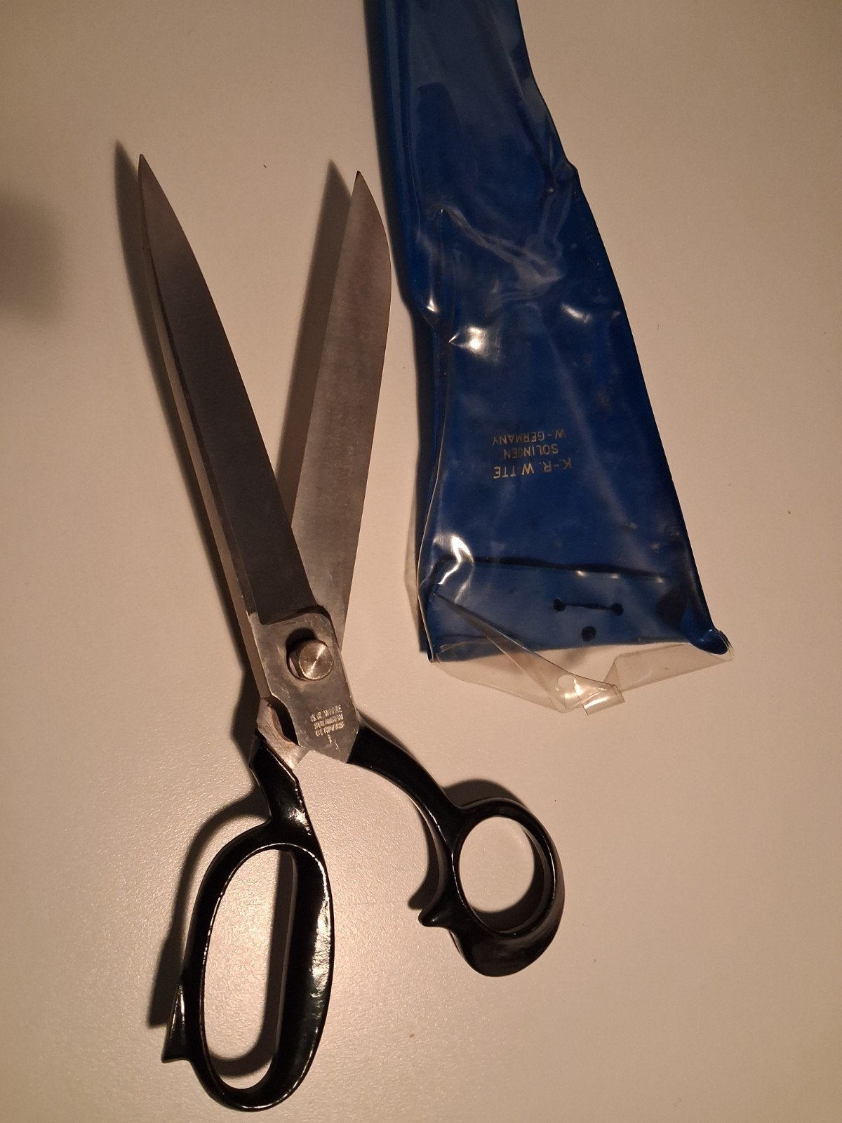 coupeer schaar, Ophalen
