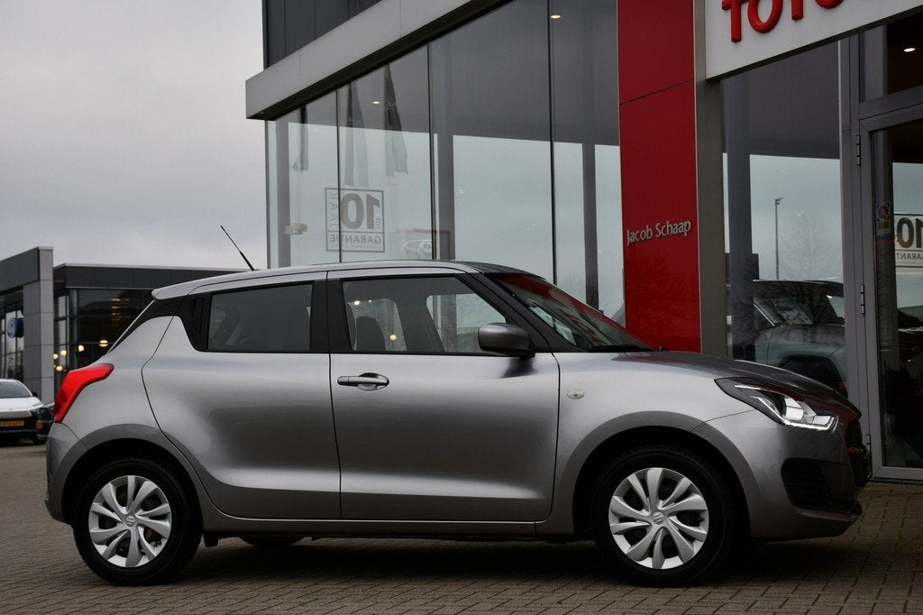 Suzuki Swift 1.2 Comfort Smart Hybrid 83pk | Cruise Control, Stof, Gebruikt, 4 cilinders, 400 kg
