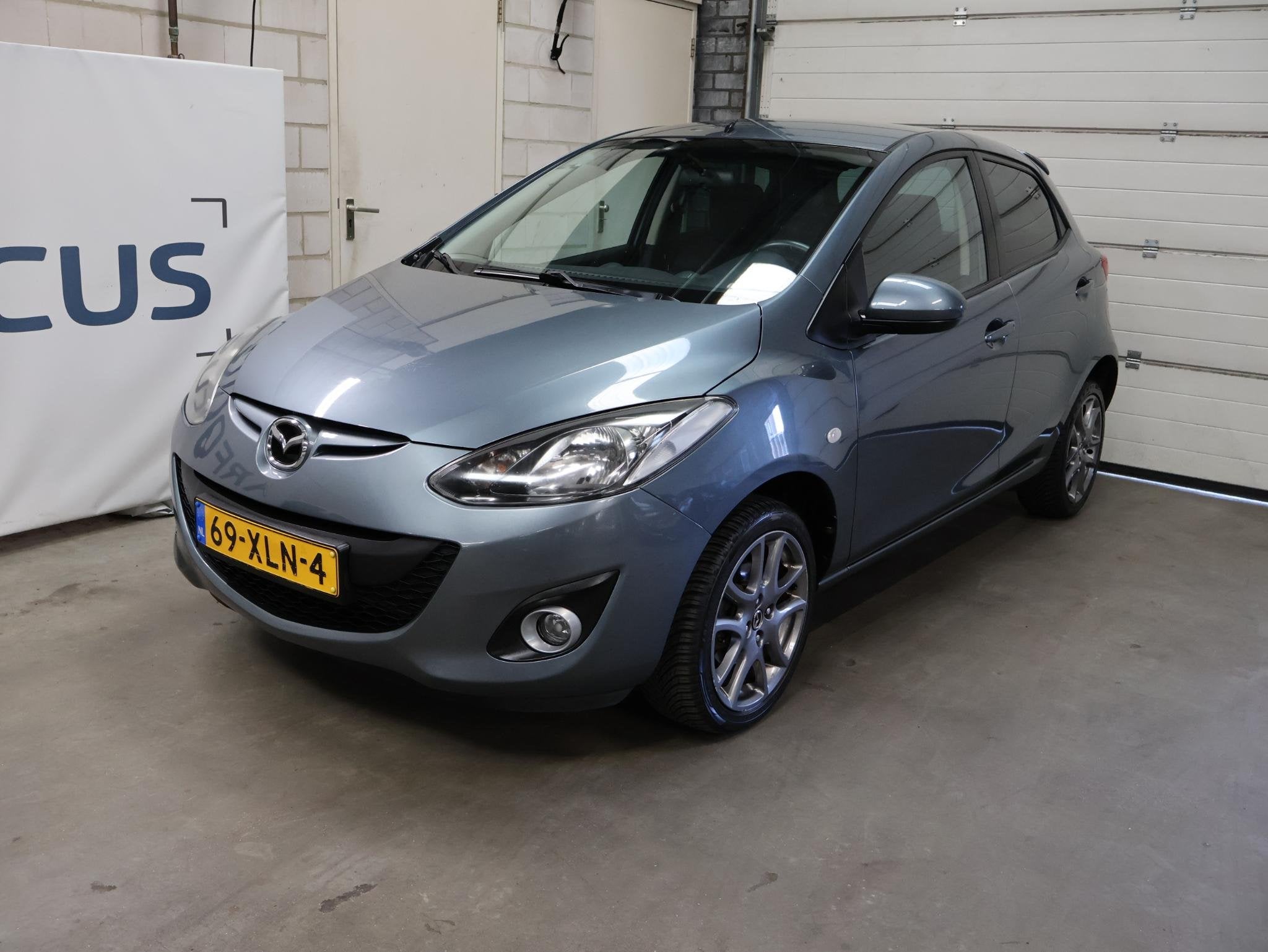 Mazda 2 1.3 GT-L NAP Airco 06-27 APK Stoelverwarming, Auto's, Voorwielaandrijving, Euro 5, Stof, Zwart