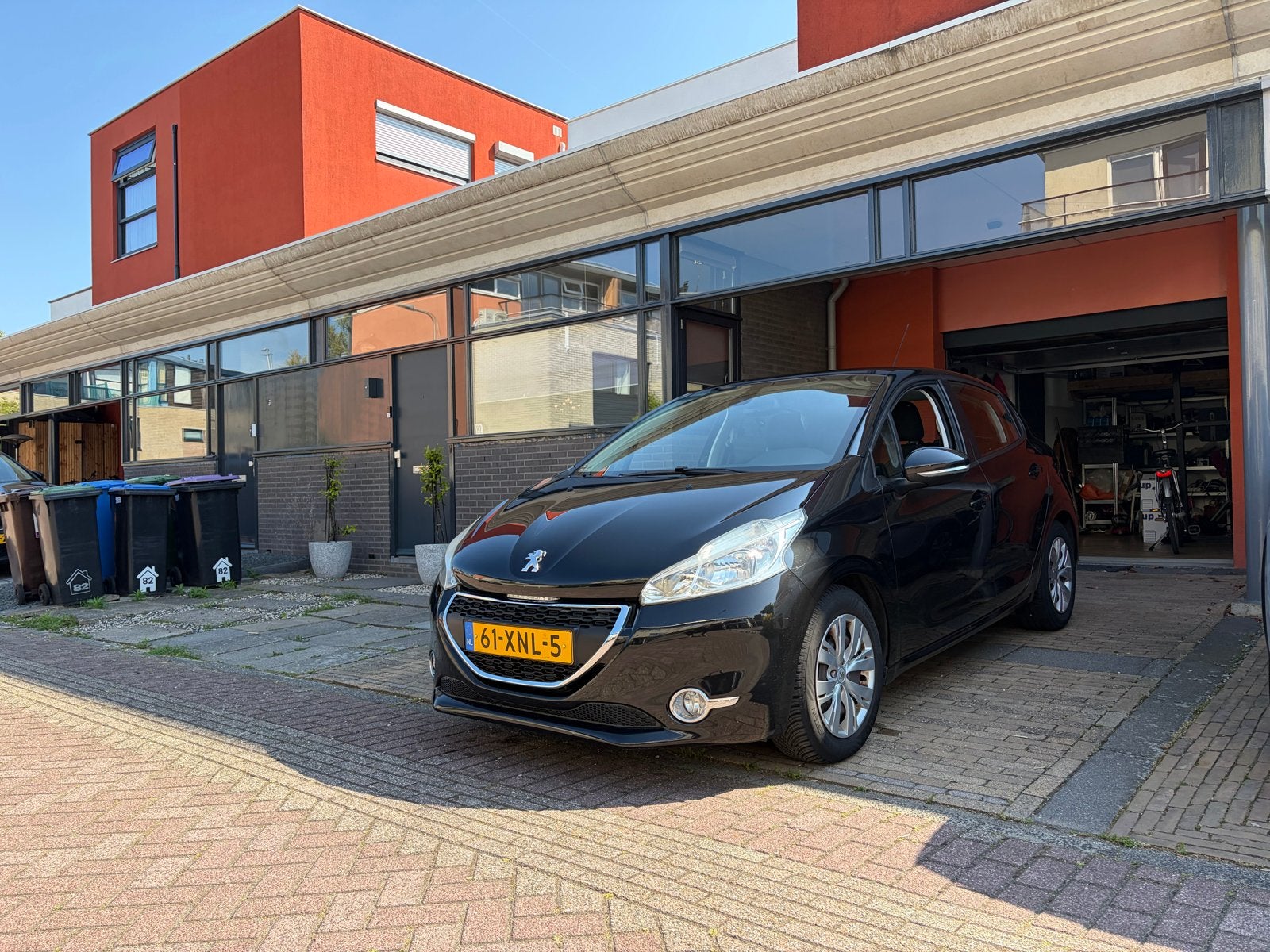 Peugeot 208 1.4 VTI 70KW/95PK 5-D 2012 Zwart, Voorwielaandrijving, 40 €/maand, Zwart, Origineel Nederlands