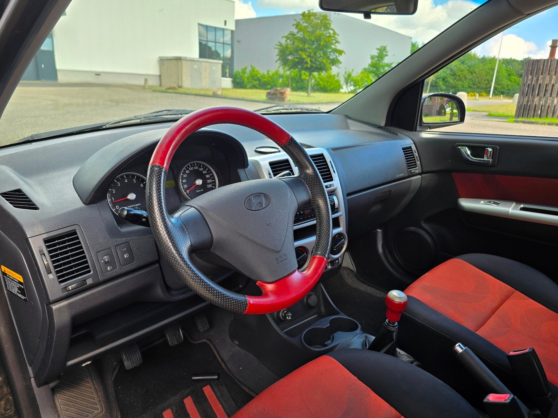 Hyundai Getz 1.4i First Edition AIRCO *87.000km*, Auto's, Hyundai, Voorwielaandrijving, 450 kg, 4 cilinders, Zwart