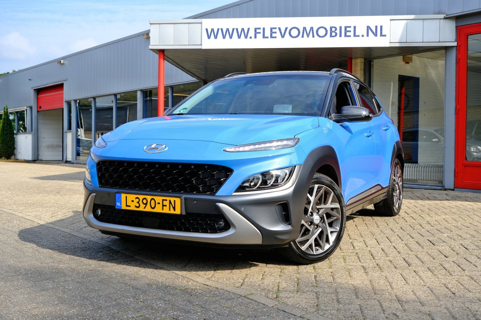 Hyundai Kona 1.6 GDI HEV Premium Aut. Leder|1e Eig|Navi|Cam|, Auto's, Gebruikt, Blauw, SUV of Terreinwagen, 1300 kg
