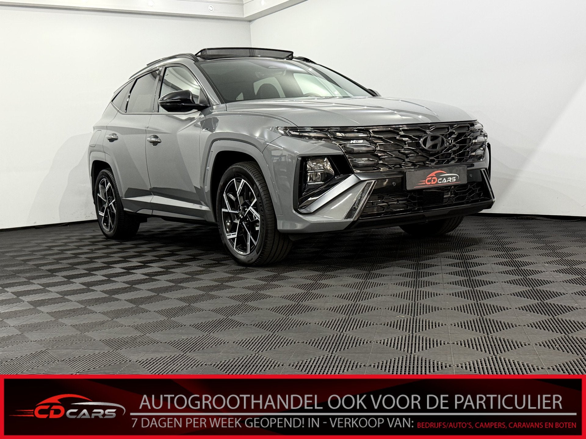Hyundai Tucson 1.6 T-GDI PHEV N Line 4WD Panoramadak, Camera, Auto's, Gebruikt, 4 cilinders, Lichtsensor, Leder en Stof