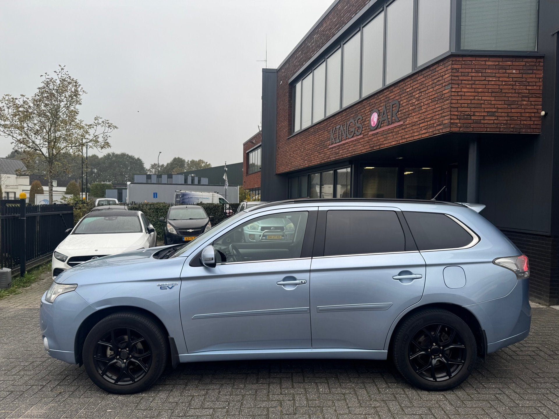Mitsubishi Outlander 2.0 PHEV instyle S DAK LEDER CAMERA TRE, Auto's, 4 cilinders, Blauw, Vierwielaandrijving, Hybride Elektrisch/Benzine