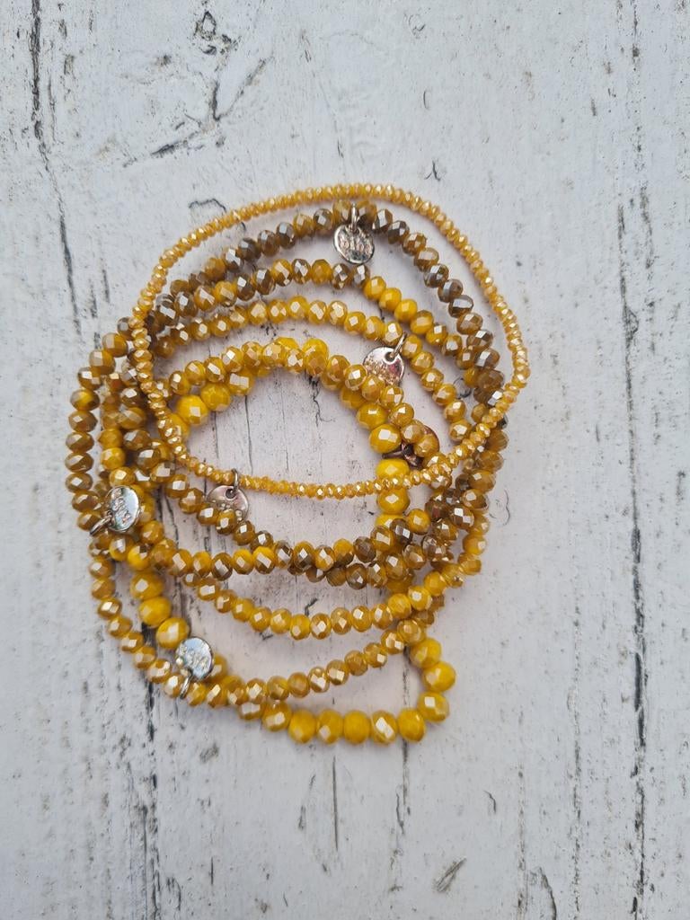 BIBA okergele kralenarmbandjes 3 euro pst nieuw, Geel, Kunststof of Plastic, Nieuw, Ophalen of Verzenden