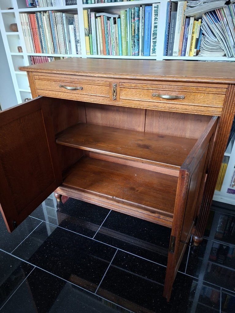 Strak art deco dressoir, Ophalen