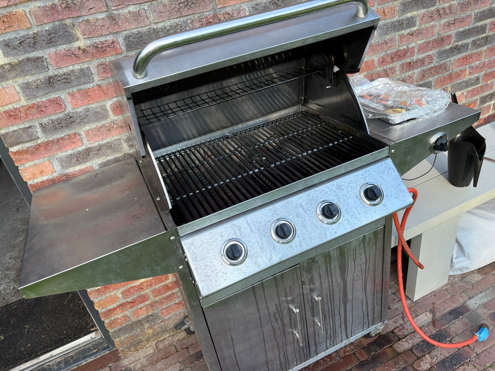Roestvrijstalen Gasbarbecue met 4 Branders en warmhouder, Tuin en Terras, Gasbarbecues, Ophalen of Verzenden, Gebruikt