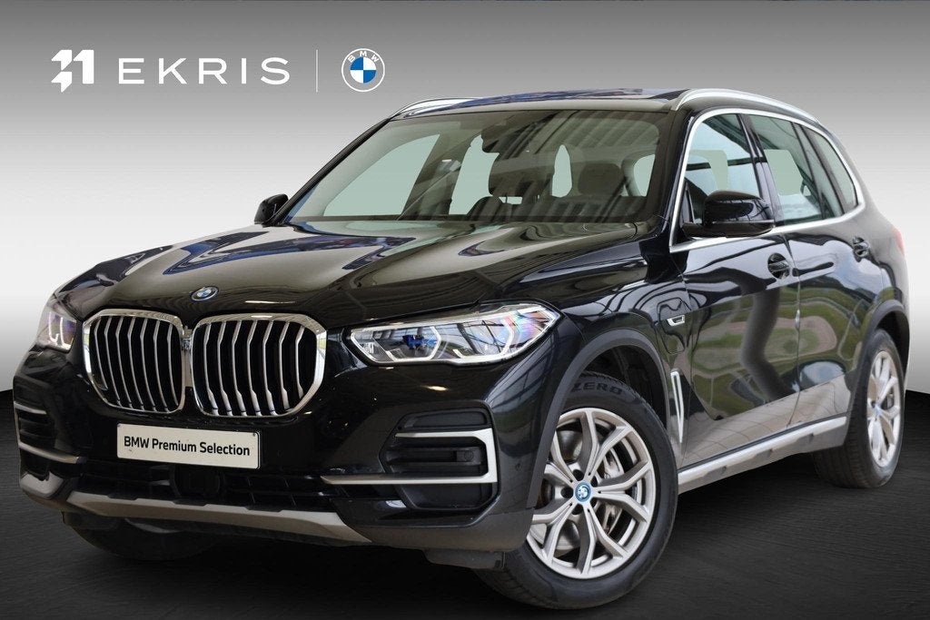 BMW X5 xDrive45e | xLine | Head-Up Display | Panorama Dak |, Auto's, BMW, Stof, Gebruikt, 394 pk, Zwart