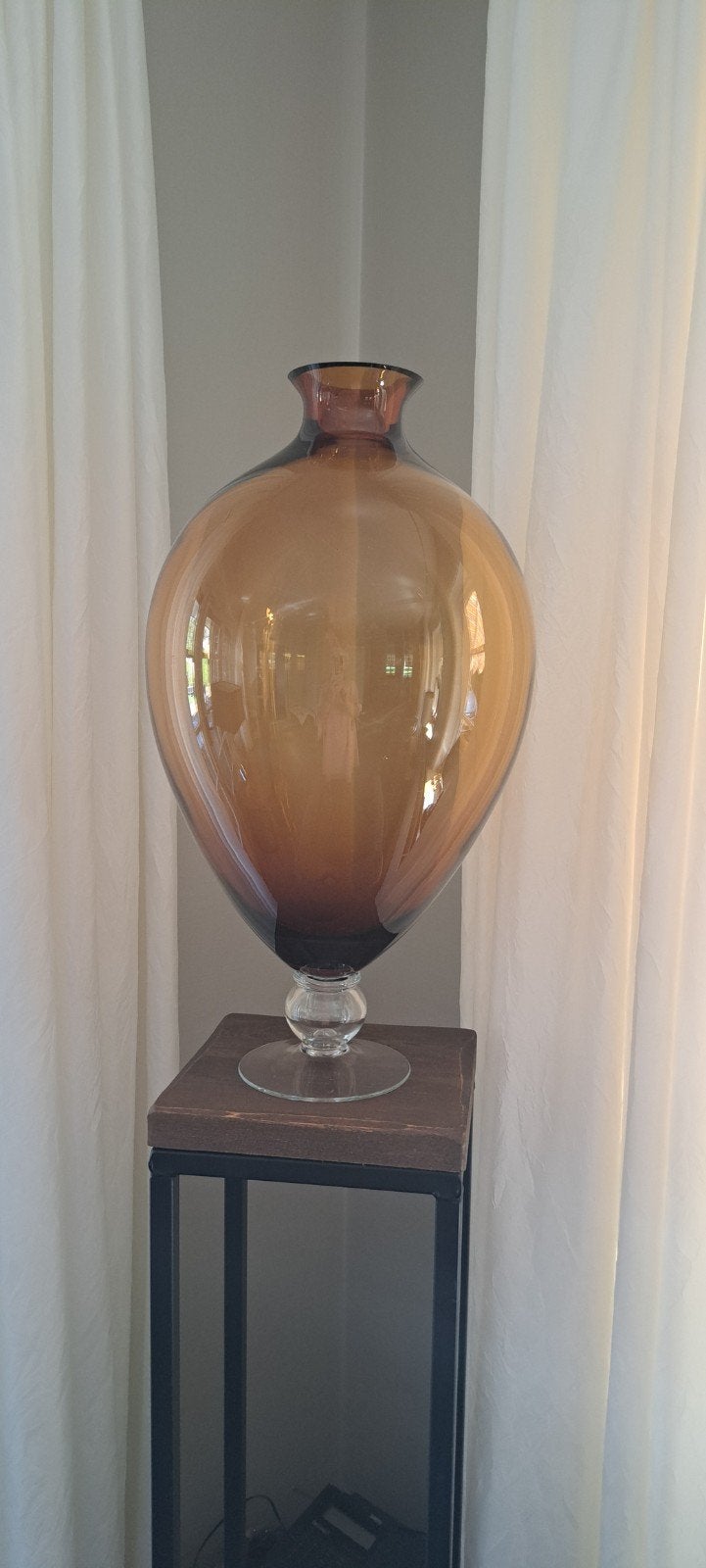 Grote glazen vaas, Ophalen