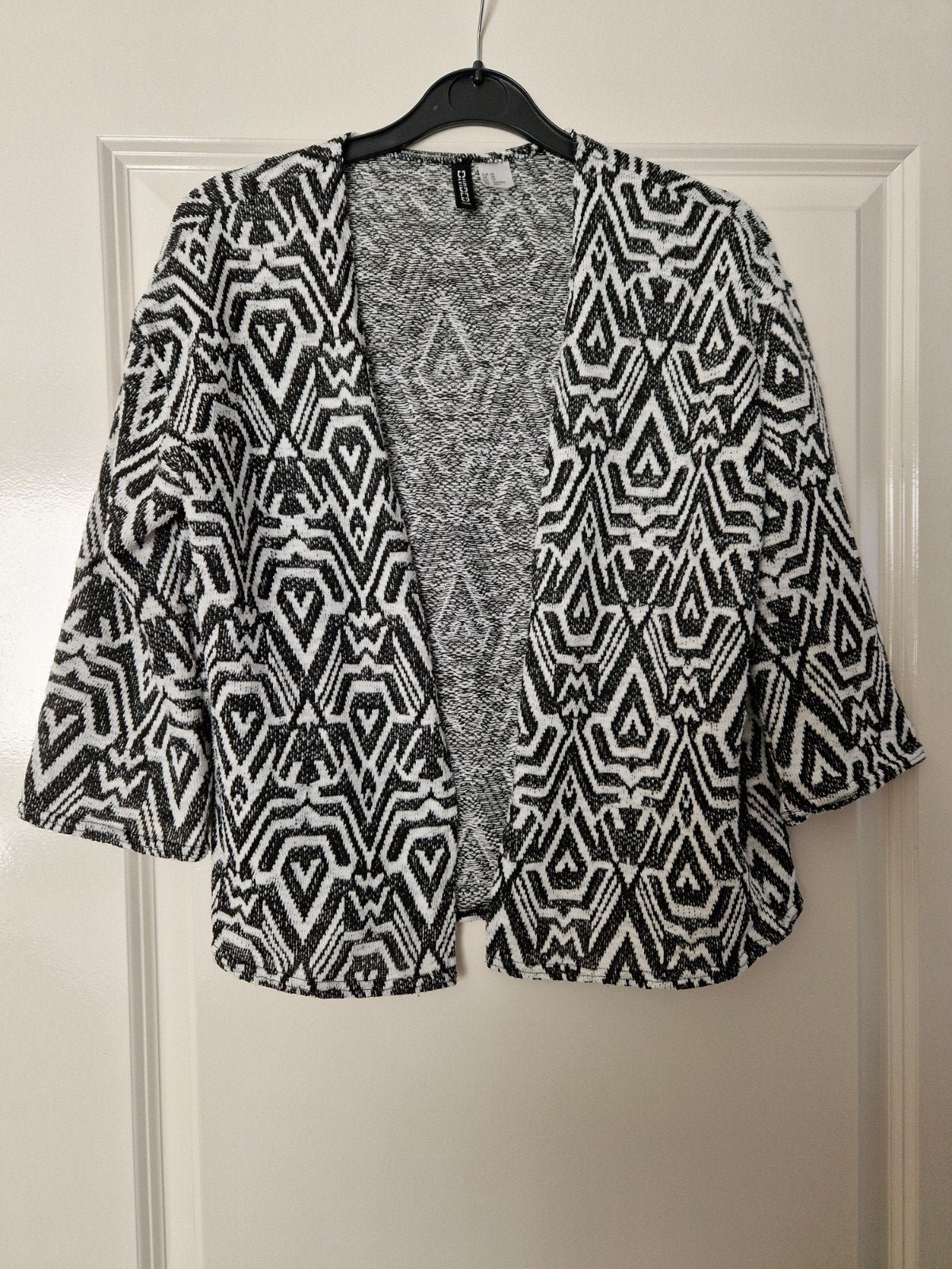 Vest zwart wit met print maat XS H&M Divided
99% polyester,, H&M, Zwart, Nieuw, Ophalen of Verzenden
