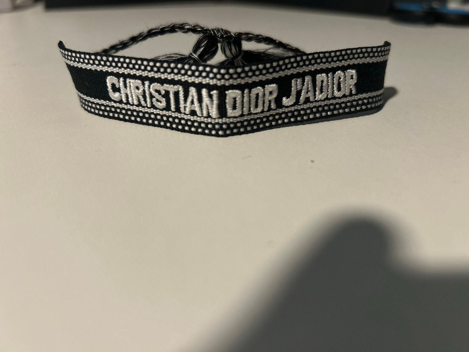 Christian Dior J'ADIOR Armband Zwart/Wit, Ophalen of Verzenden, Zo goed als nieuw, Zwart, Overige materialen