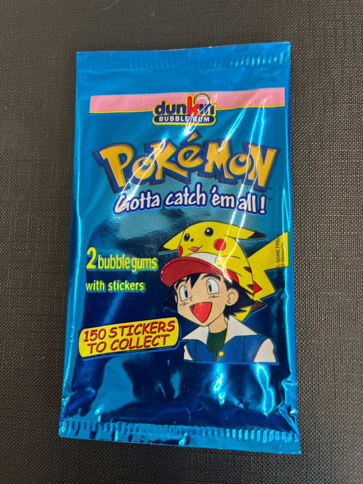 Pokemon booster empty dunkin bubblegums Pikachu/ash, Ophalen of Verzenden, Zo goed als nieuw, Booster