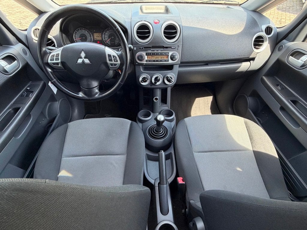 Mitsubishi Colt 1.3 CZ5 5-deurs Intro Edition, NAP, Airco, C, Stof, Gebruikt, Colt, Origineel Nederlands