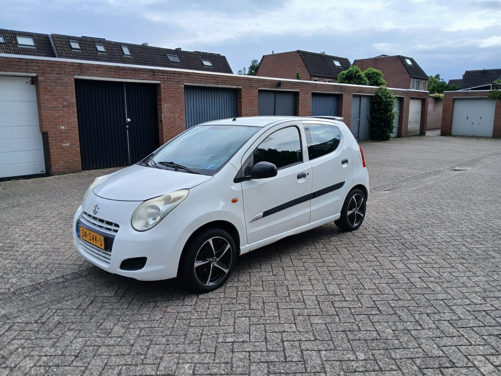 Suzuki Alto 1.0 2011 Wit, Auto's, Suzuki, Voorwielaandrijving, 200 kg, 4 stoelen, Origineel Nederlands