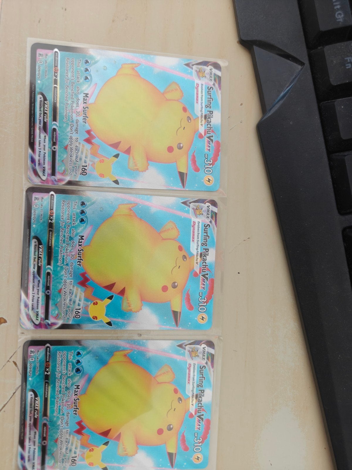 3 surfing Pikachu VMAX uit celebrations, Ophalen of Verzenden, Nieuw, Losse kaart, Foil