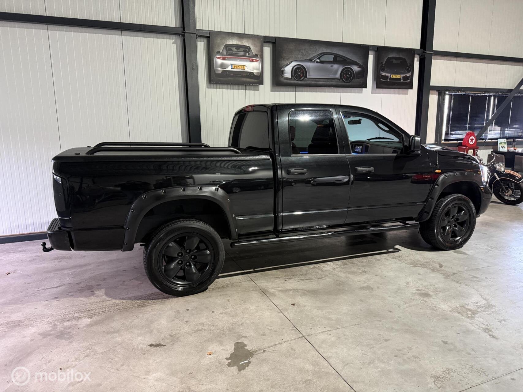 Dodge Ram 1500 sport 4x4 LPG Nieuwe apk, Auto's, Verwarmde buitenspiegels, Gebruikt, 8 cilinders, Bedrijf
