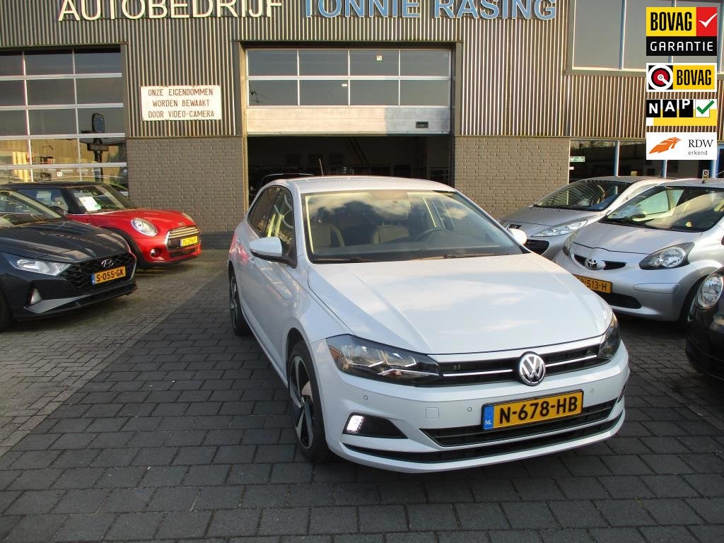 Volkswagen Polo 1.0 TSI HighlineAutumaat,parelmoer wit, Auto's, Volkswagen, Gebruikt, Euro 6, 95 pk, Bedrijf