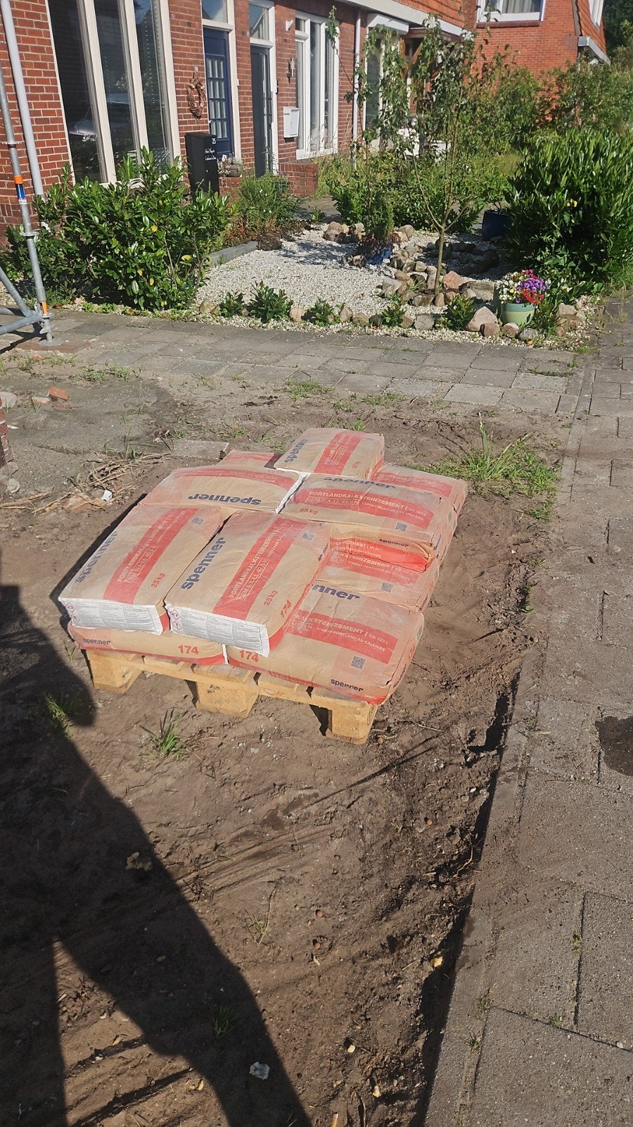 12 zakken nieuwe Portland cement (Spenner), Ophalen