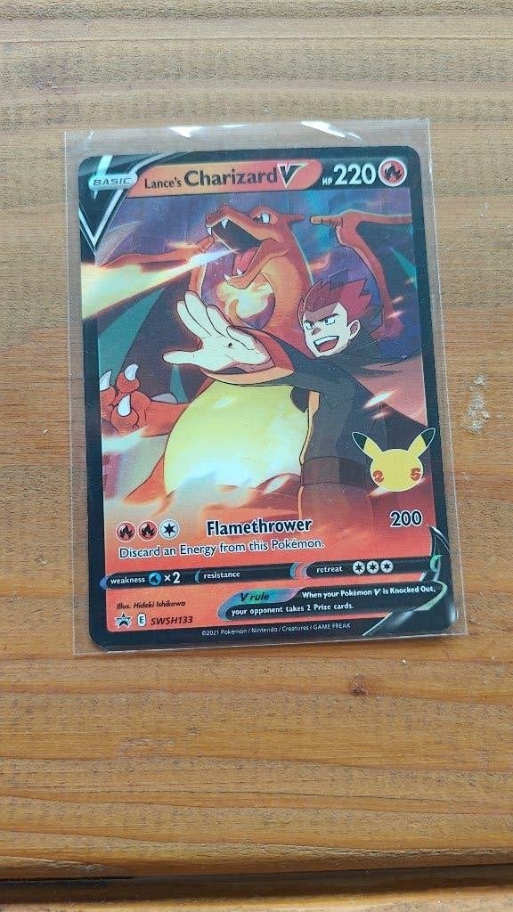 Lance's Charizard V SWSH133 Celebrations Promo, Ophalen of Verzenden, Zo goed als nieuw, Losse kaart