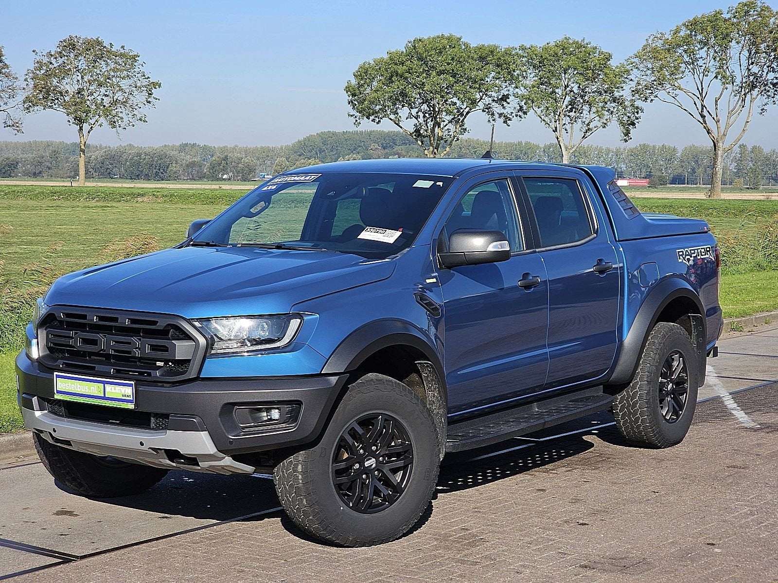 FORD RANGER 2.0 RAPTOR Automaat 4x4 SideSteps Trekhaak 1e Ei, Auto's, Automaat, Gebruikt, 2506 kg, Blauw