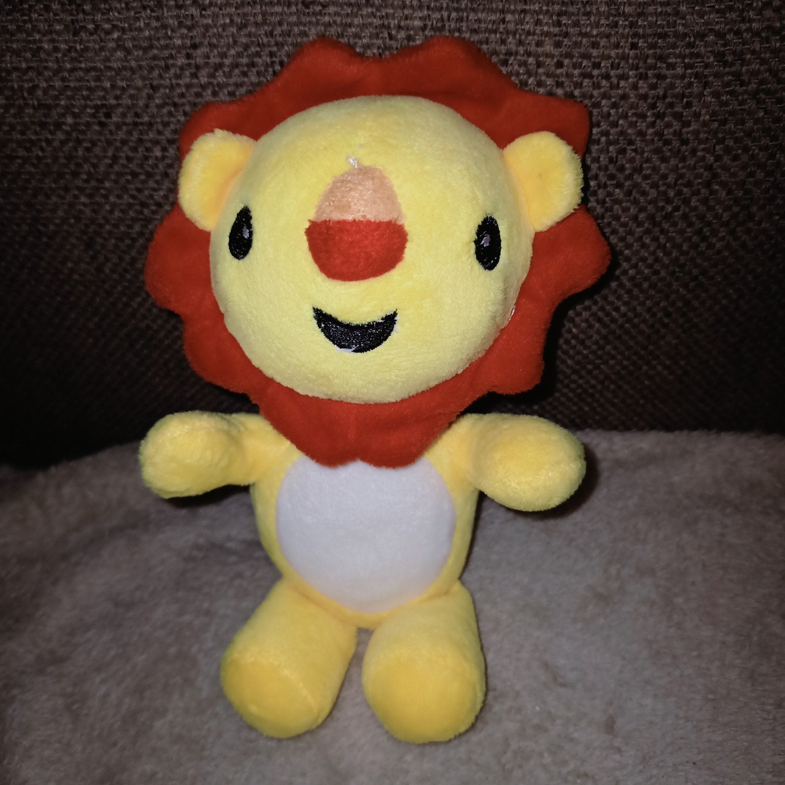 Fisher price, leeuw knuffeltje met rammelaar., Overige merken, Geel, Ophalen of Verzenden, Zo goed als nieuw