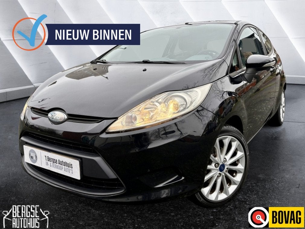 Ford Fiesta 1.25 Ghia Airco Lmv Aux (bj 2009), Auto's, Dealer onderhouden, Stof, Gebruikt, 4 cilinders