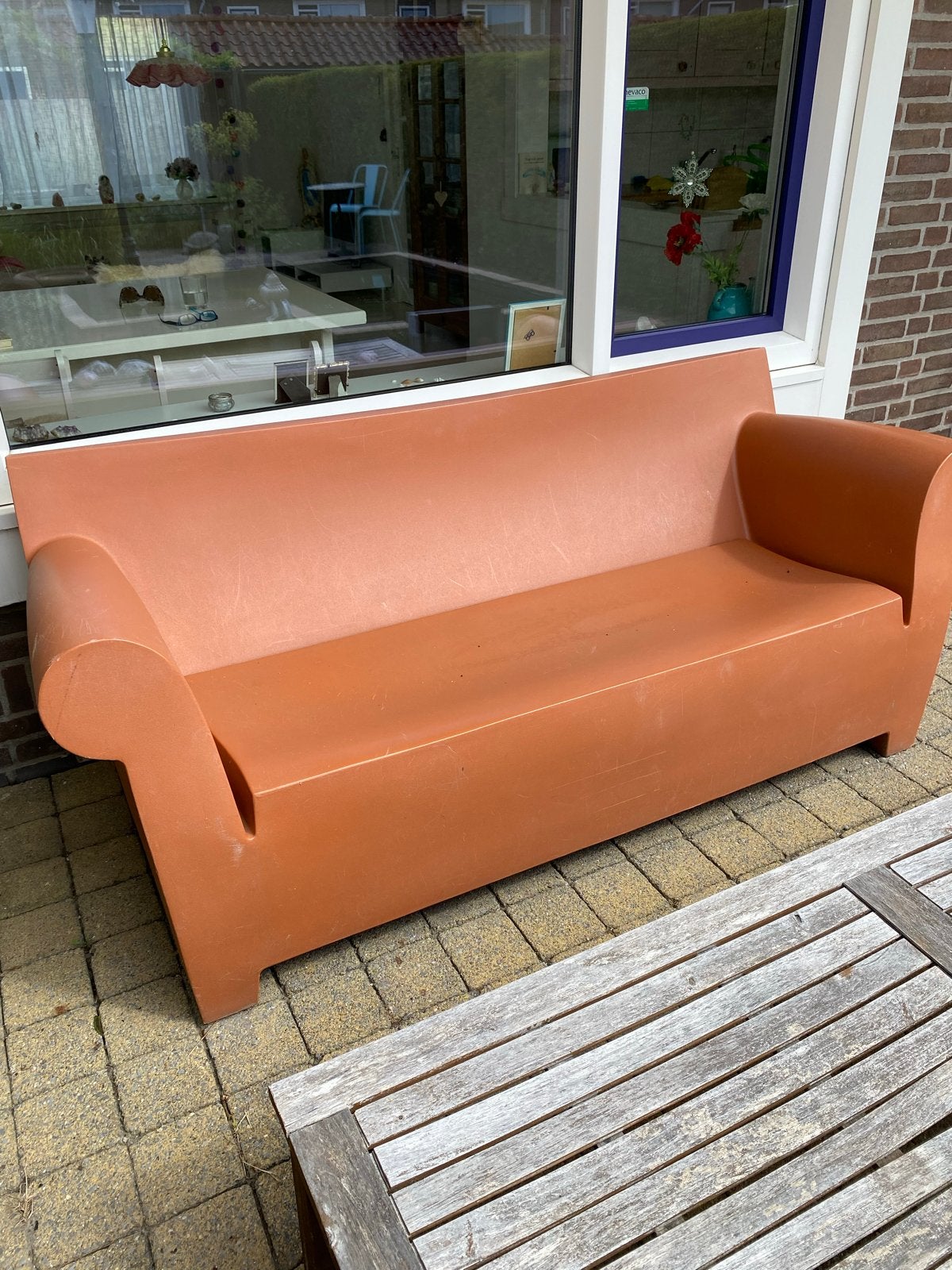 Oranje kunststof tuinbank - 2-zits merk kartell, Tuin en Terras, Ophalen, Gebruikt, Kunststof