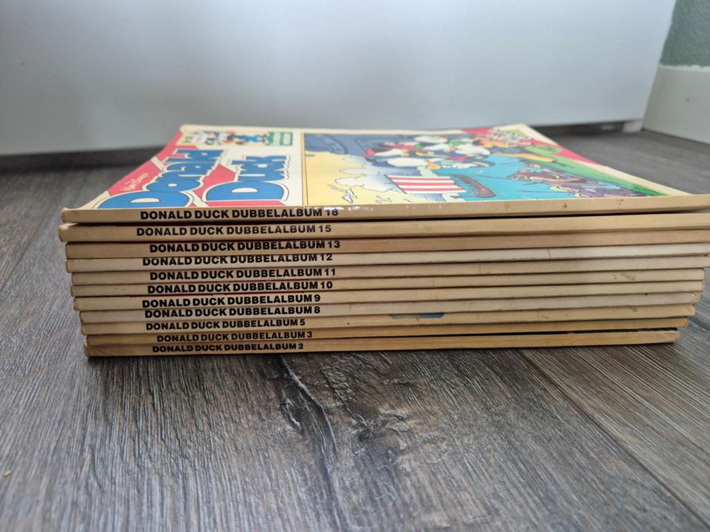 Donald Duck Dubbelalbum - 11 stuks, Boeken, Complete serie of reeks, Ophalen of Verzenden, Gelezen, Walt Disney
