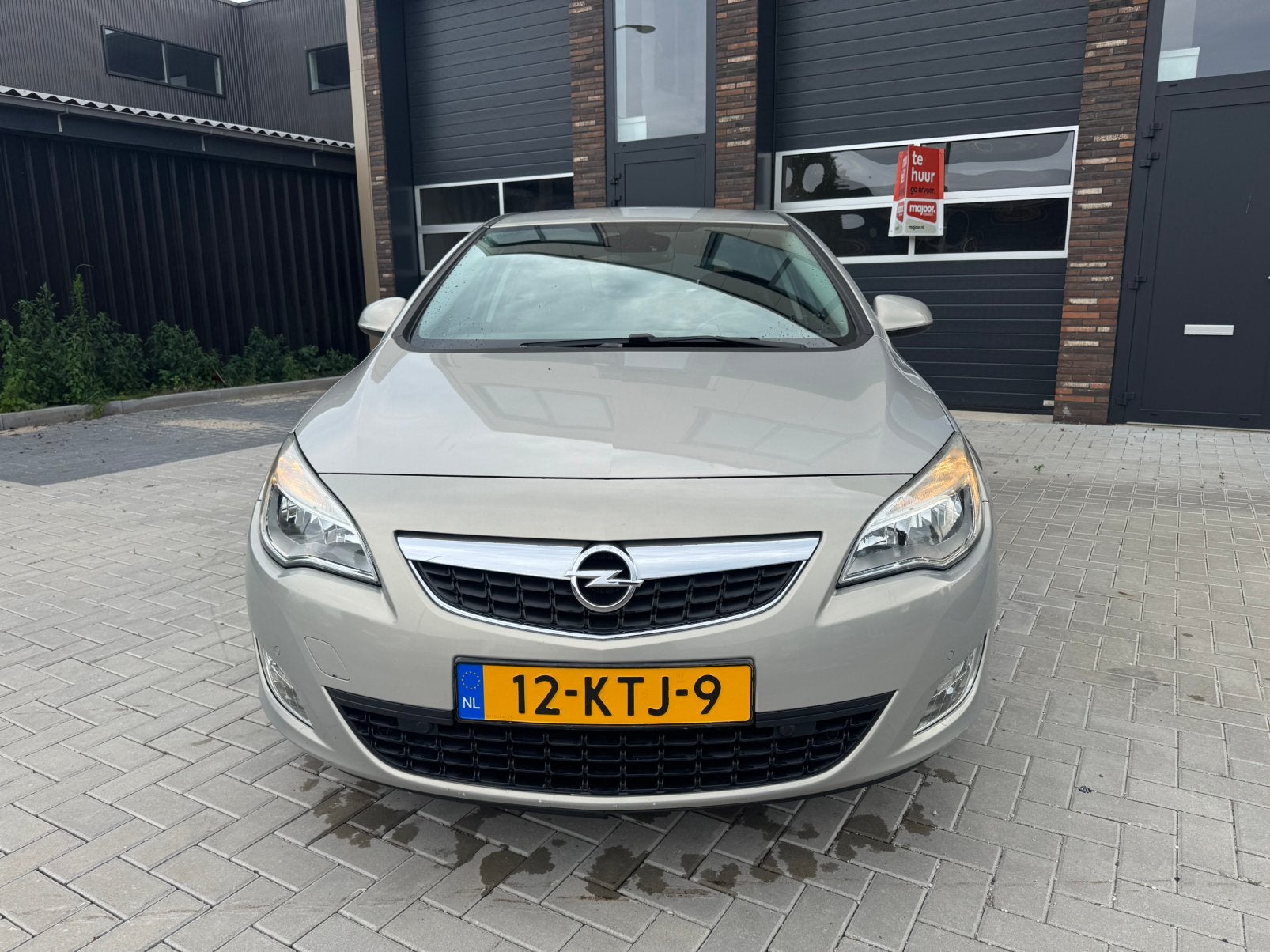 Opel Astra 1.6 16V 5D 2010 Beige, Auto's, Voorwielaandrijving, 1250 kg, 680 kg, 4 cilinders