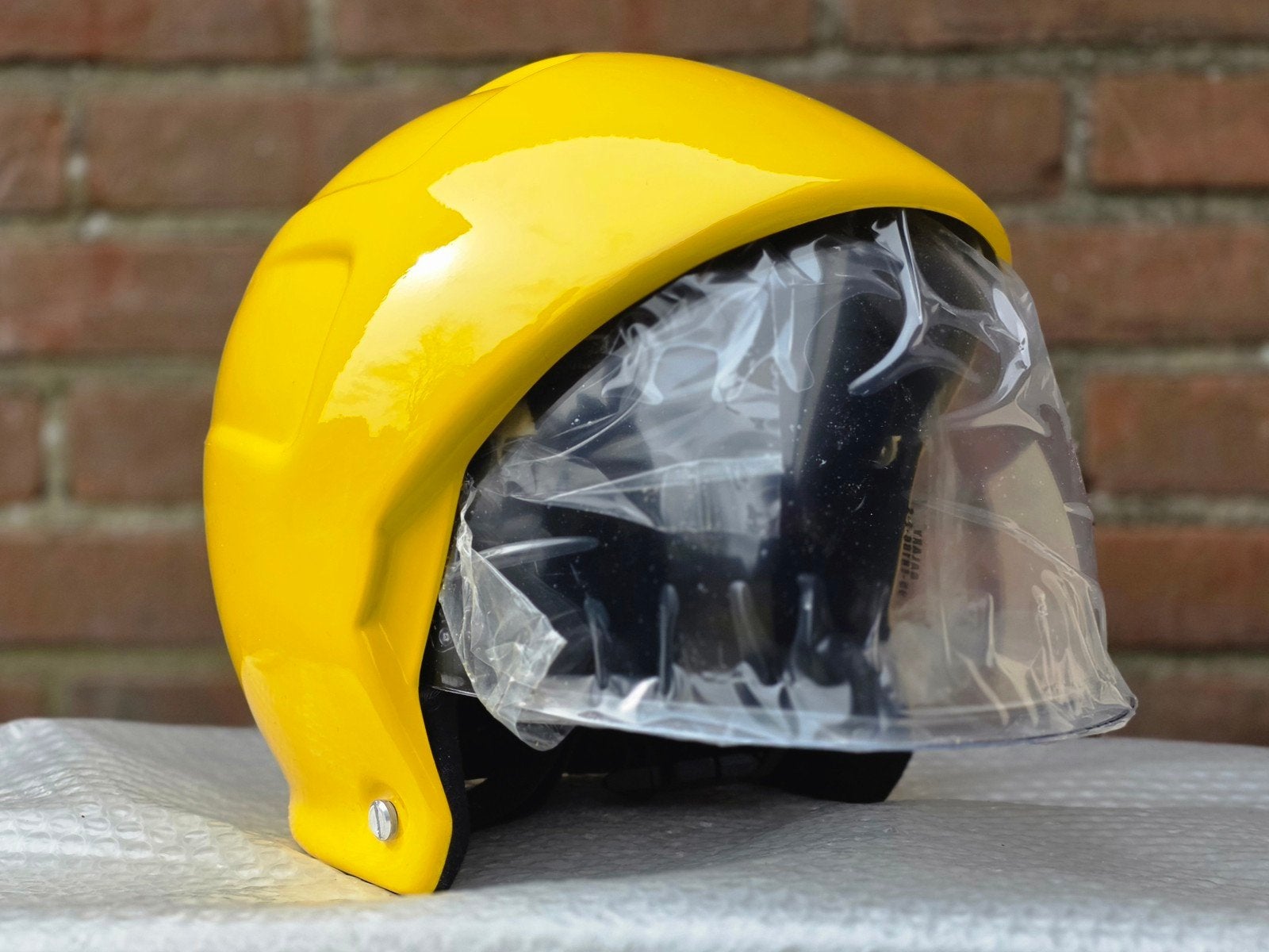 brandweerhelm brandweer Nieuw, Verzamelen, Ophalen of Verzenden, Landmacht, Nederland, Embleem of Badge