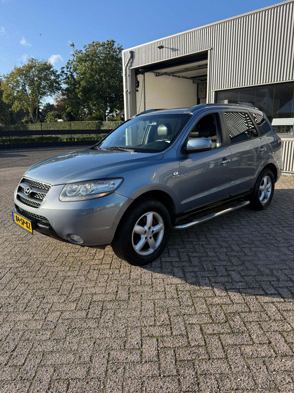 Hyundai Santa Fe 2.7 4WD 7-ST AUT 2006 Blauw Trekhaak, Auto's, Automaat, Santa Fe, 2000 kg, Blauw
