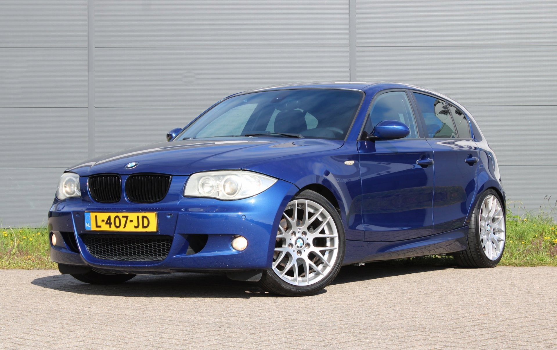 BMW 1-serie 120i M-Pakket Navi Xenon LeMansBlauw Stoelverwar, Auto's, Achterwielaandrijving, Zwart, 4 cilinders, Blauw