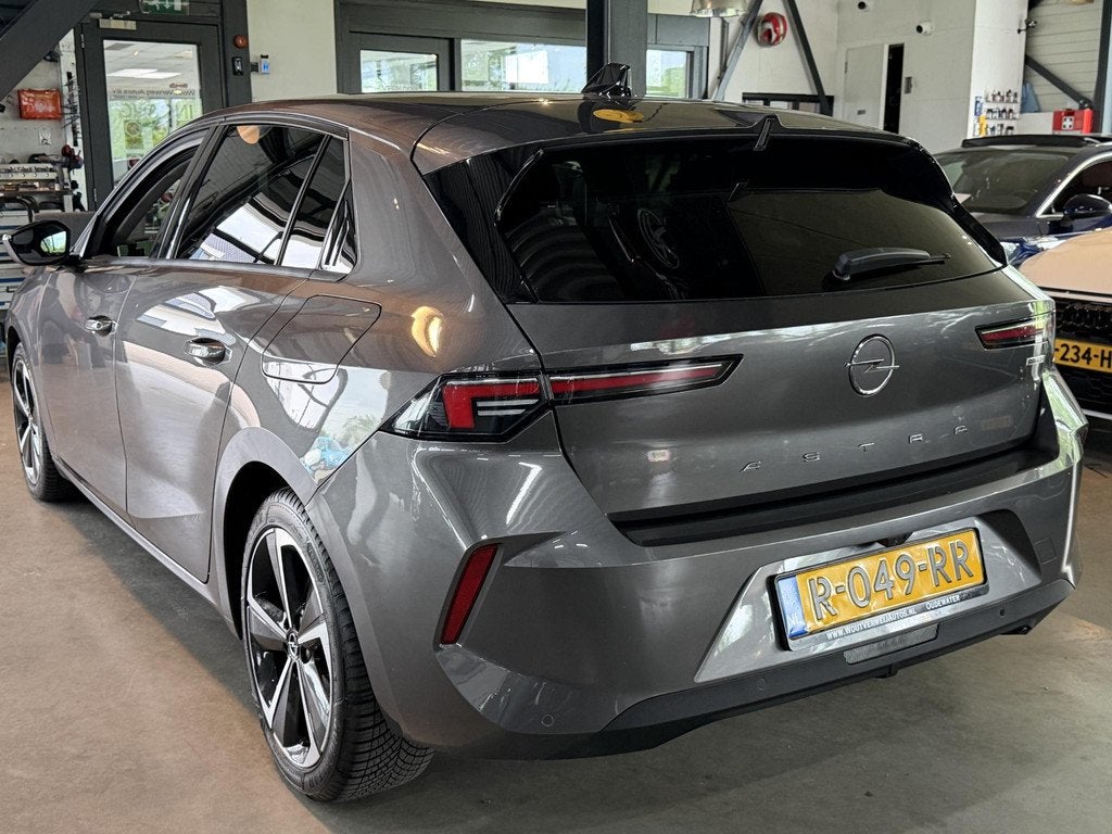 Opel Astra 1.6 turbo PHEV 133Kw Business Edition Hybride, Auto's, Opel, Stof, Gebruikt, 4 cilinders, 181 pk