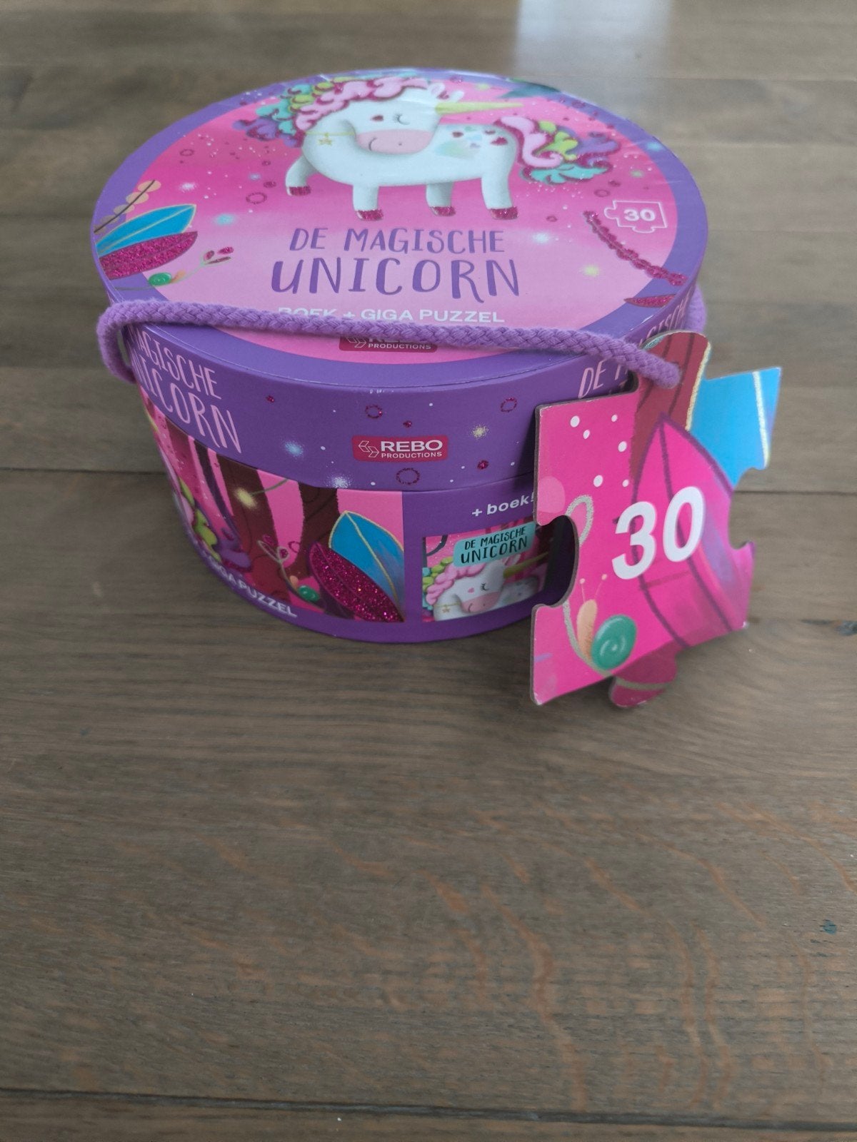 Magische unicorn: boek + giga puzzel 30 stuks, Ophalen of Verzenden, 10 tot 50 stukjes, Gebruikt