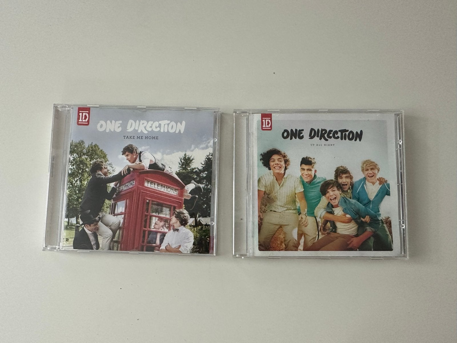 One Direction CD's: Take Me Home & Up All Night, Ophalen of Verzenden, Zo goed als nieuw, Boybands & Girlbands, Inclusief doosje