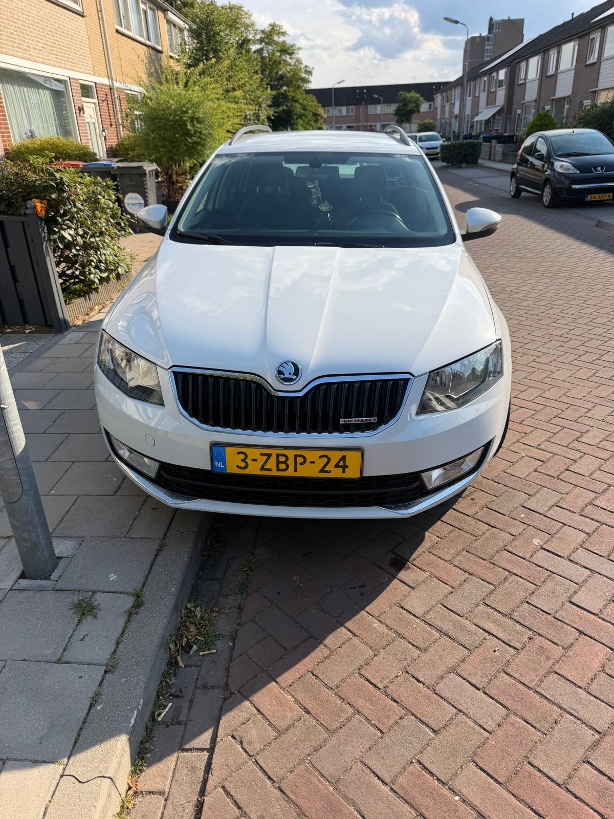 Skoda Octavia 1.6 TDI 81KW Combi 2014 Wit, Auto's, Skoda, Voorwielaandrijving, Euro 5, Stof, Zwart